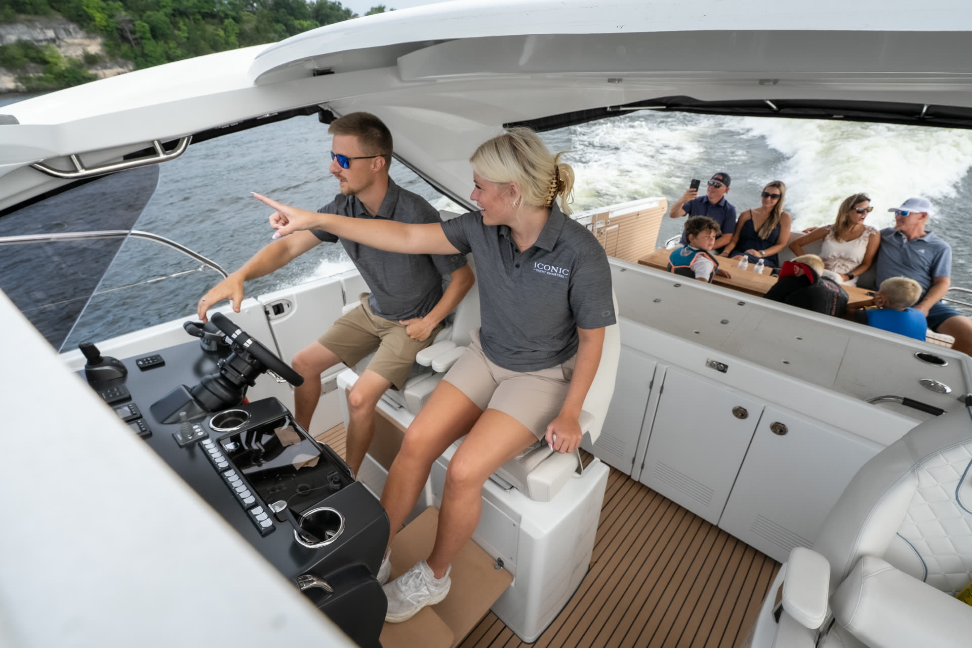 Iconic Yacht Charters captain and crew guiding guests on a Lake of the Ozarks charter